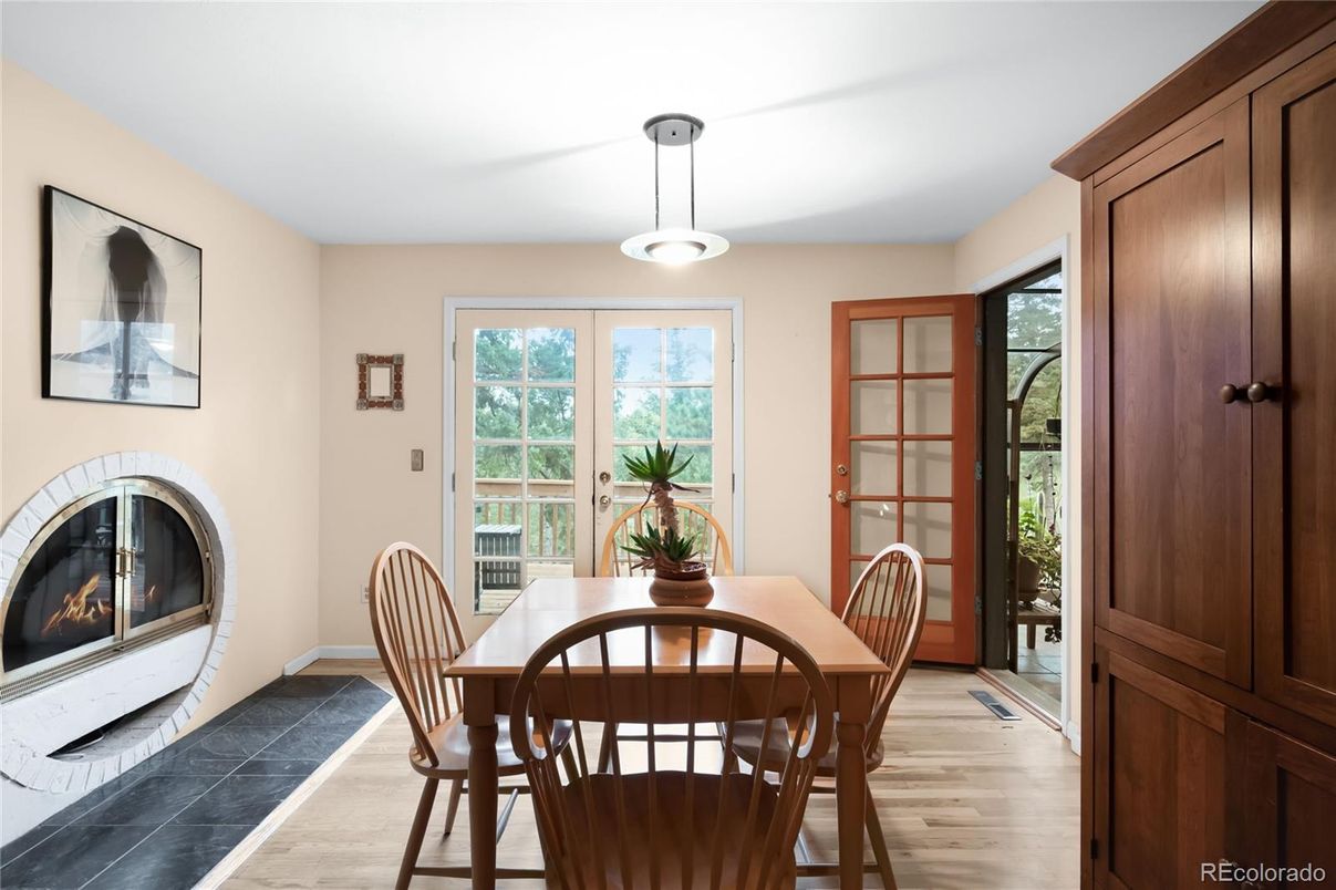 Dining room, Fireplace, Interior, Pendant Lights, Wood Texture Flooring