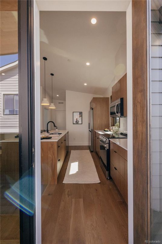 Interior, Kitchen, Pendant Lights, Recessed Lighting, Stainless Steel Appliances, Wood Texture Flooring