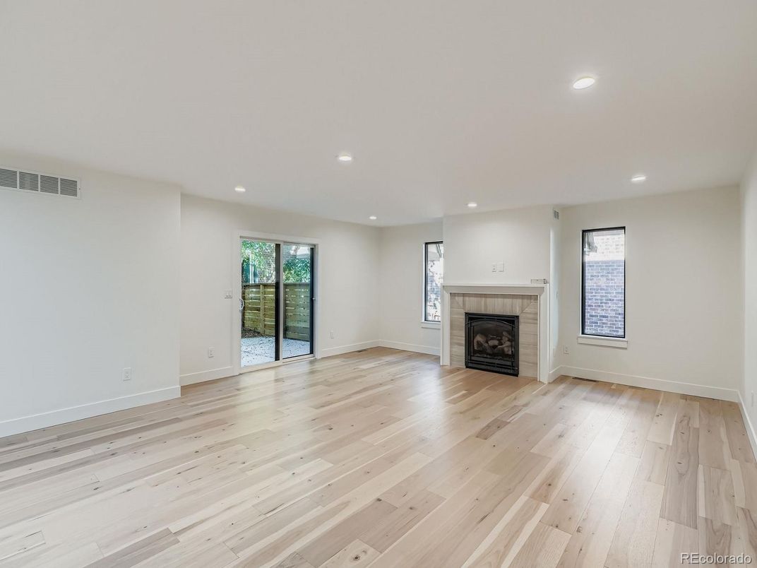 Empty room, Fireplace, Interior, Recessed Lighting, Wood Texture Flooring