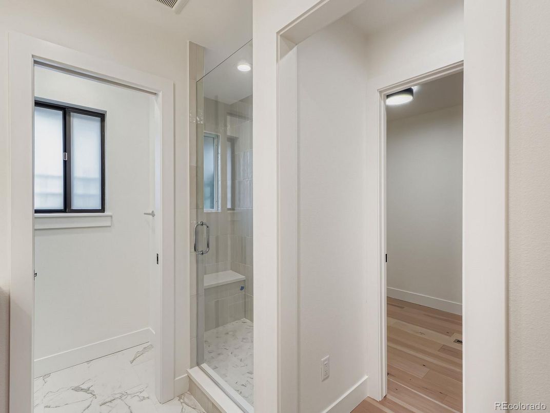 Bathroom, Glass Shower, Interior, Marble, Recessed Lighting, Wood Texture Flooring