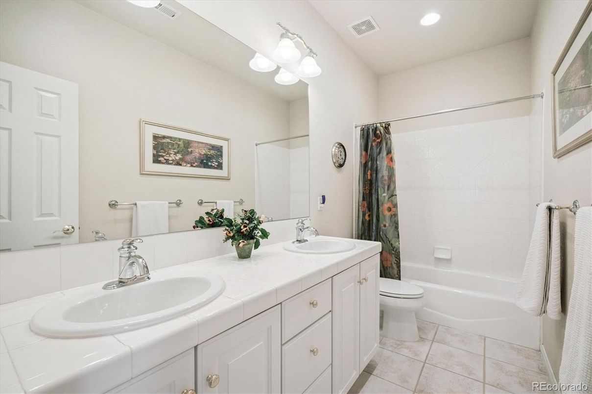 Bathroom, Dual Sink Vanities, Interior, Recessed Lighting, Tile Countertops
