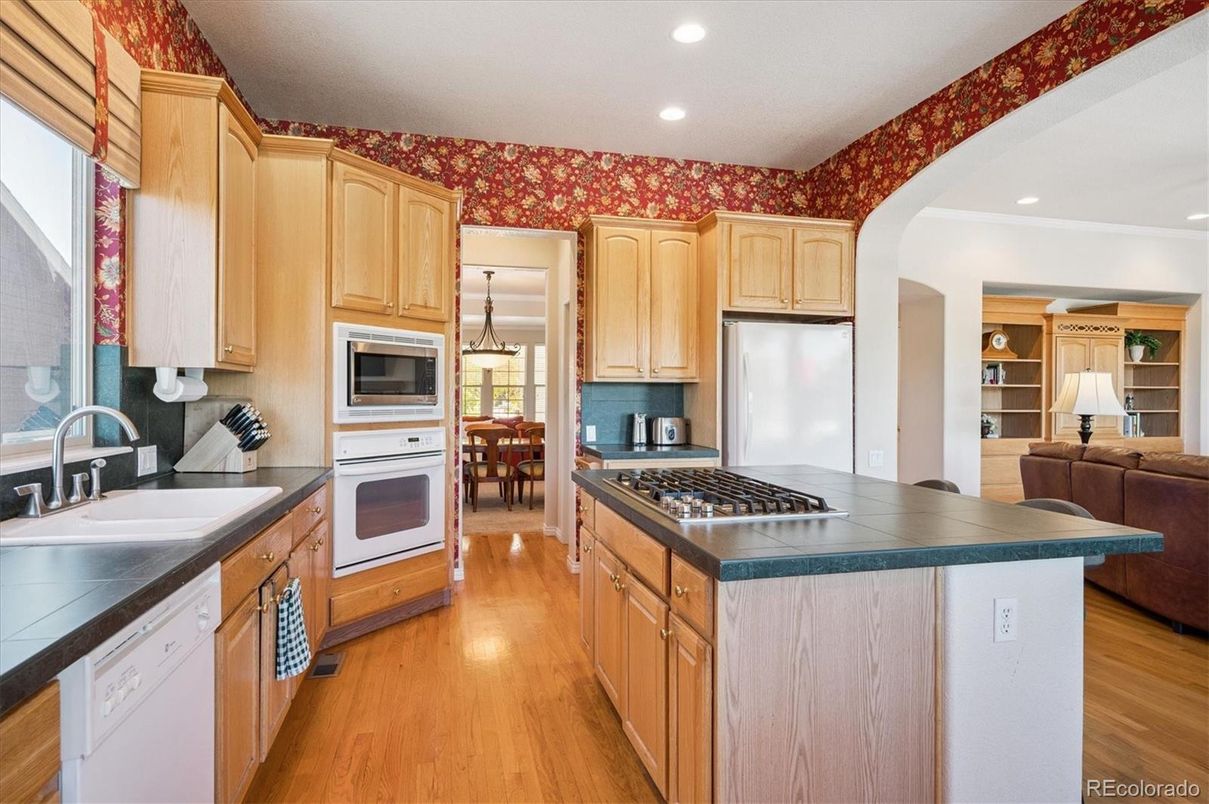 Interior, Kitchen, Living room, Recessed Lighting, Stainless Steel Appliances, Tile Countertops, Wood Texture Flooring