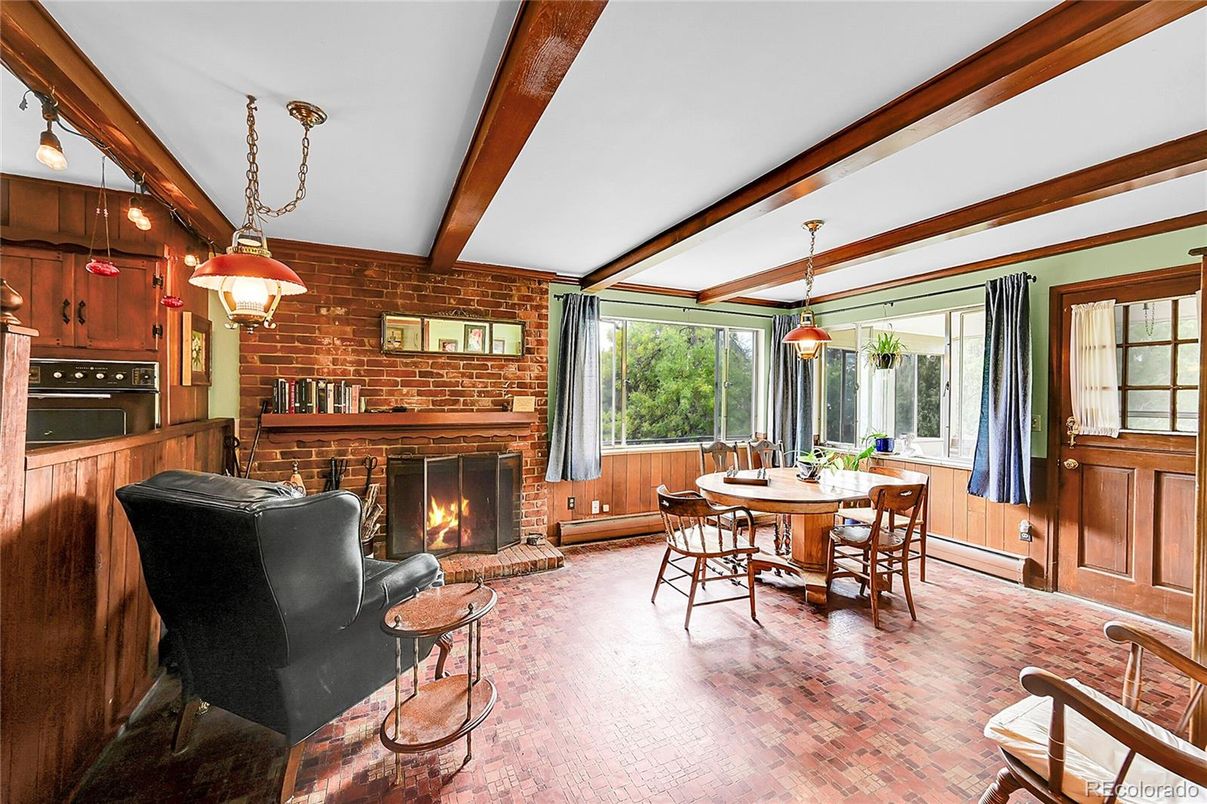 Dining room, Fireplace, Interior, Pendant Lights, Stone Walls, Wooden Beams