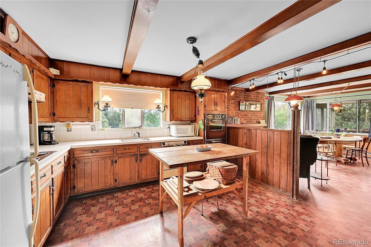 Dining room, Interior, Kitchen, Pendant Lights, Stainless Steel Appliances, Wood Texture Flooring