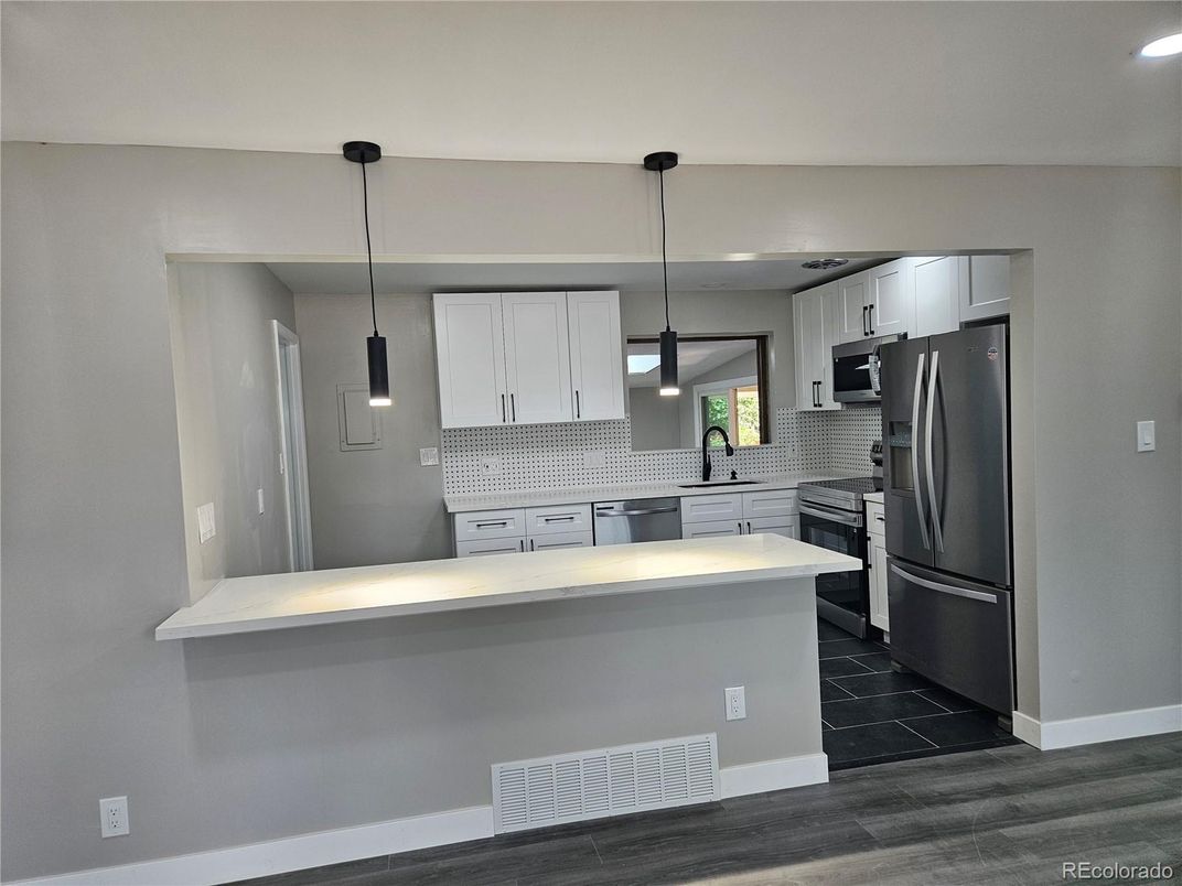 Interior, Kitchen, Pendant Lights, Recessed Lighting, Stainless Steel Appliances, Wood Texture Flooring