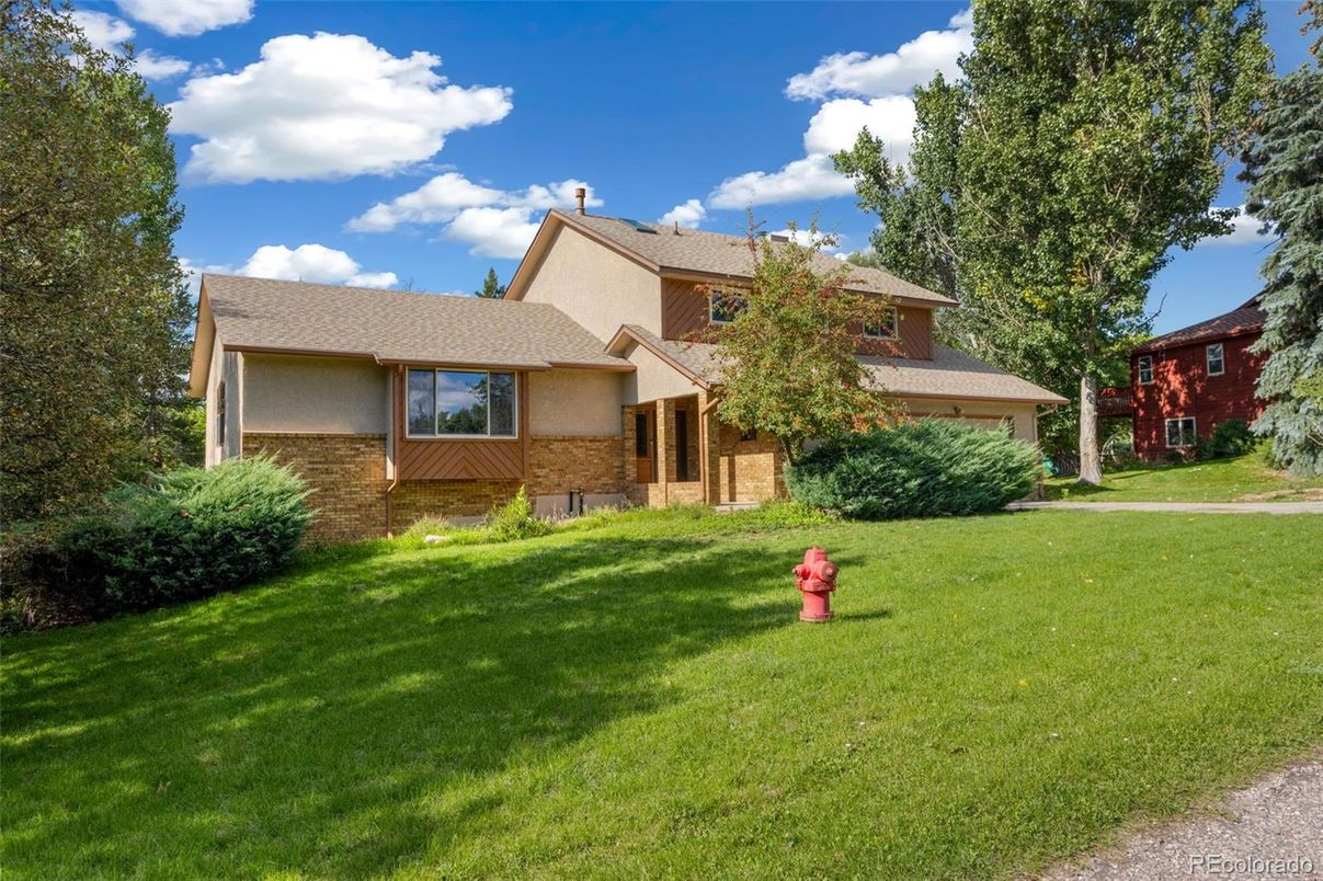 Attached, Backyard, Exterior, Facade, Brick Facade, Split Level