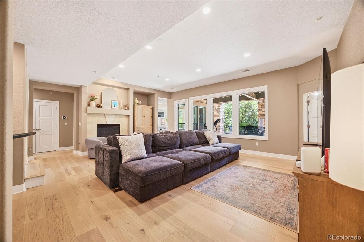 Fireplace, Interior, Living room, Recessed Lighting, Wood Texture Flooring