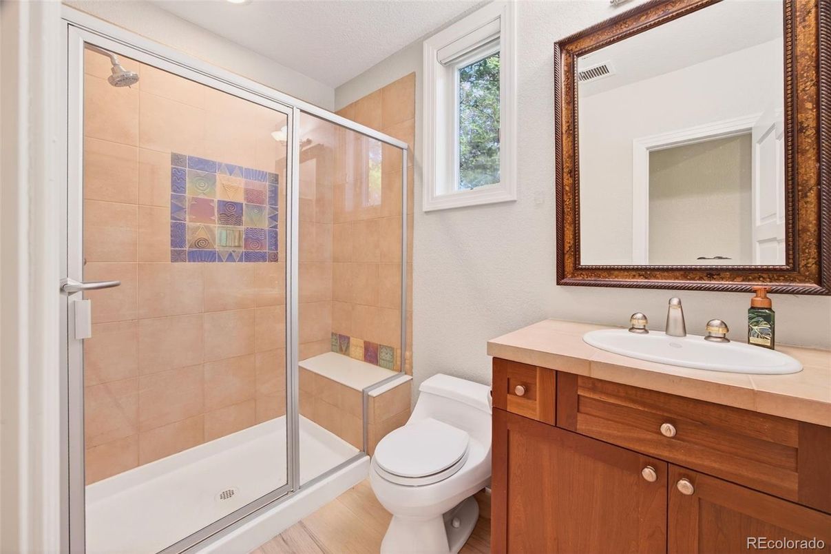 Bathroom, Glass Shower, Interior, Tile Countertops, Wood Texture Flooring