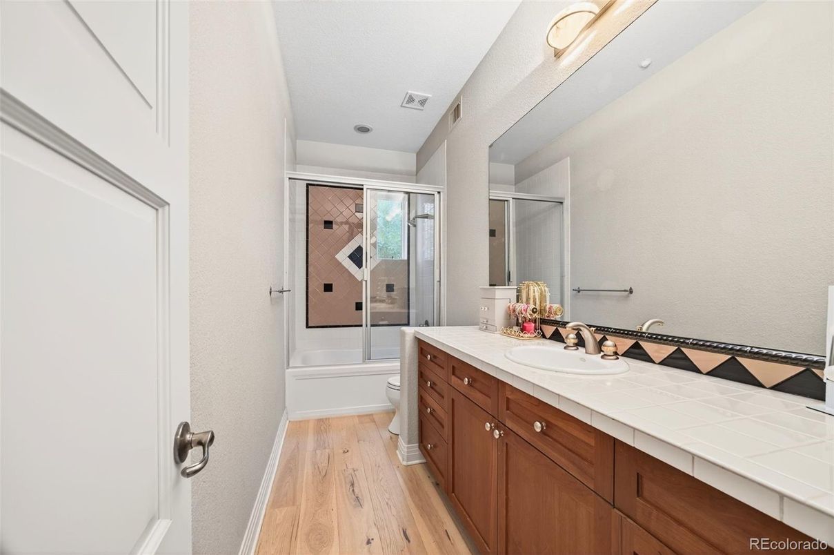 Bathroom, Dual Sink Vanities, Interior, Tile Countertops, Wood Texture Flooring