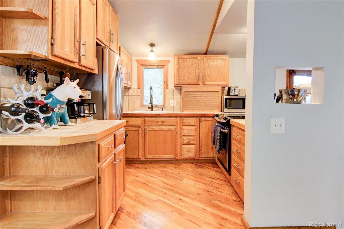 Interior, Kitchen, Tile Countertops, Wood Texture Flooring