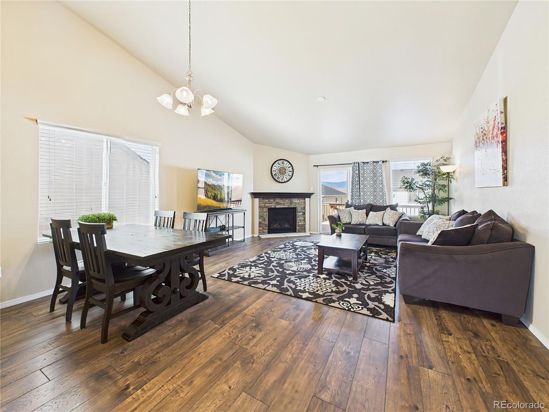 Dining room, Fireplace, Interior, Living room, Pendant Lights, Wood Texture Flooring