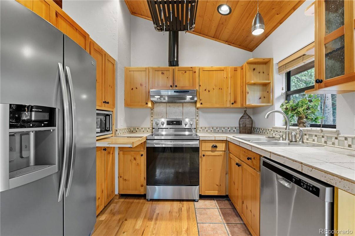 Interior, Kitchen, Recessed Lighting, Stainless Steel Appliances, Tile Countertops, Wooden Ceilings, Wood Texture Flooring