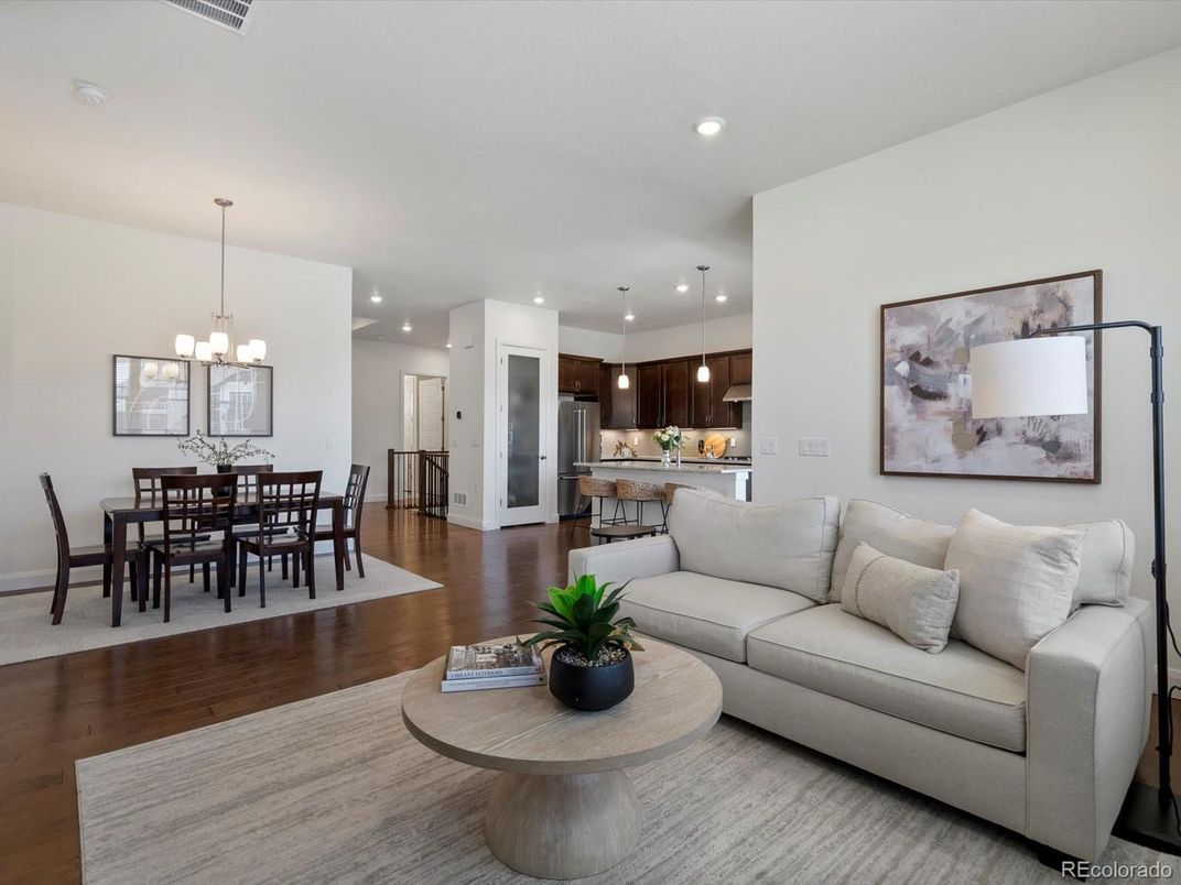 Dining room, Interior, Kitchen, Living room, Pendant Lights, Recessed Lighting, Stainless Steel Appliances, Wood Texture Flooring