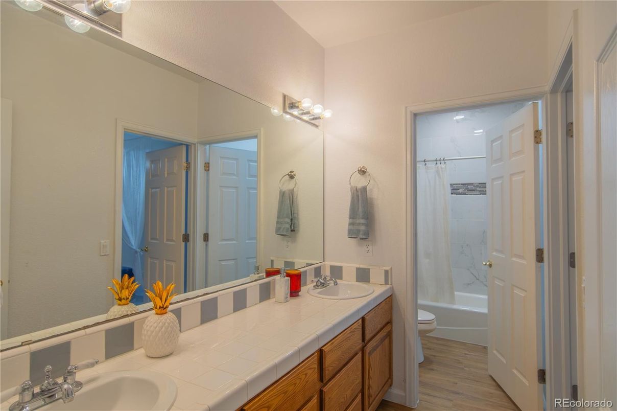 Bathroom, Dual Sink Vanities, Interior, Tile Countertops, Wood Texture Flooring