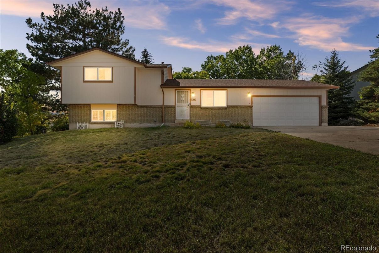 Attached, Backyard, Exterior, Facade, Brick Facade, Split Level