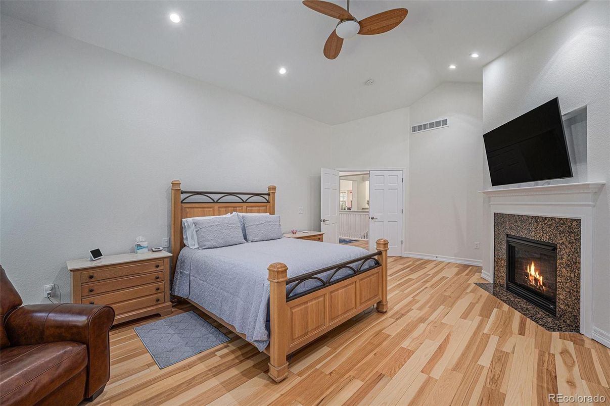 Bedroom, Fireplace, Interior, Recessed Lighting, Wood Texture Flooring
