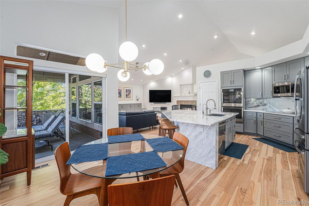 Dining room, Interior, Kitchen, Living room, Pendant Lights, Recessed Lighting, Stainless Steel Appliances, Wood Texture Flooring