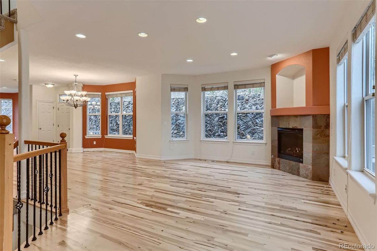 Chandelier, Empty room, Fireplace, Interior, Recessed Lighting, Wood Texture Flooring