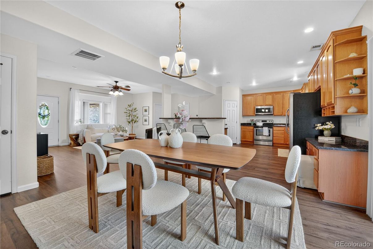 Chandelier, Dining room, Interior, Kitchen, Pendant Lights, Recessed Lighting, Stainless Steel Appliances, Wood Texture Flooring