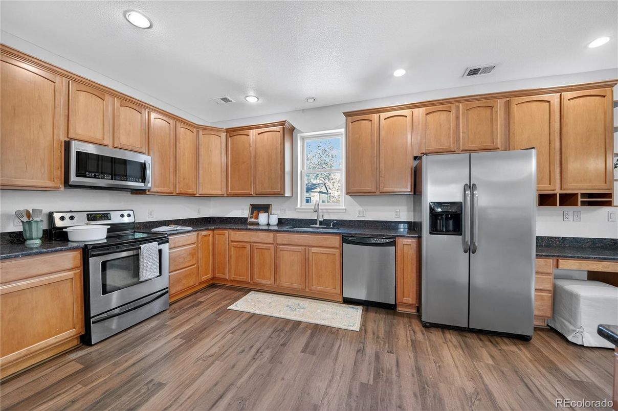 Interior, Kitchen, Recessed Lighting, Stainless Steel Appliances, Wood Texture Flooring