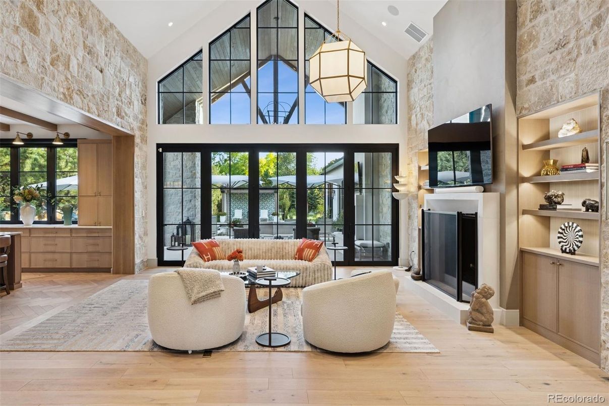 Fireplace, Interior, Living room, Pendant Lights, Recessed Lighting, Stone Walls, Wood Texture Flooring