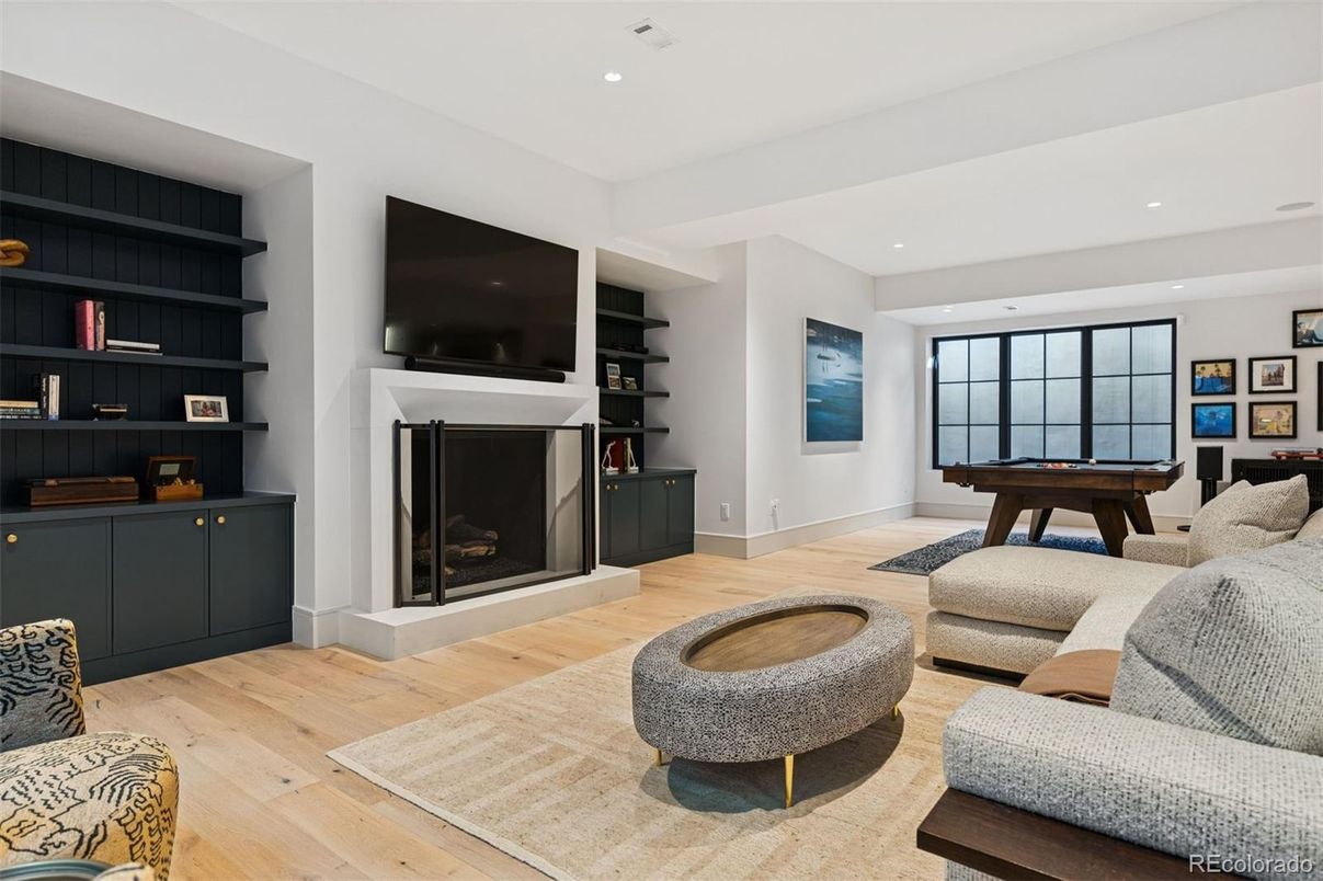 Billiard Table, Fireplace, Game Room, Interior, Living room, Recessed Lighting, Wood Texture Flooring
