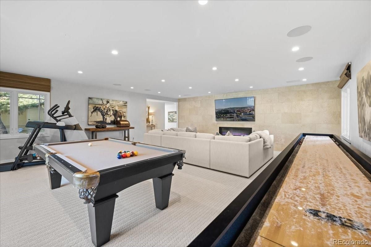 Billiard Table, Fitness Equipment, Game Room, Interior, Living room, Recessed Lighting, Stone Walls