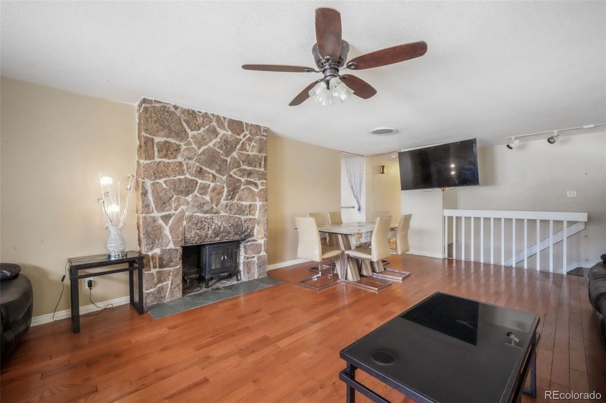 Dining room, Fireplace, Interior, Stone Walls, Wood Texture Flooring