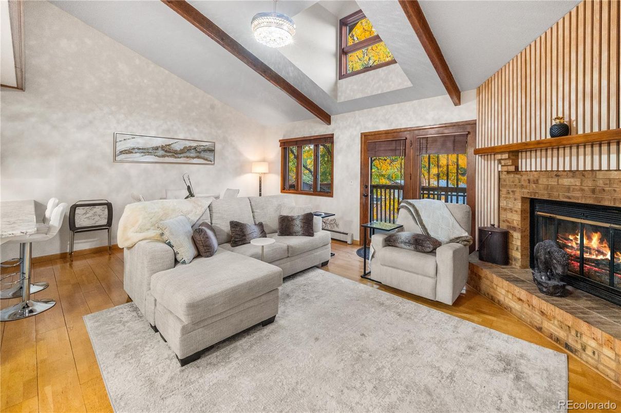 Chandelier, Fireplace, Interior, Living room, Wooden Beams, Wood Texture Flooring