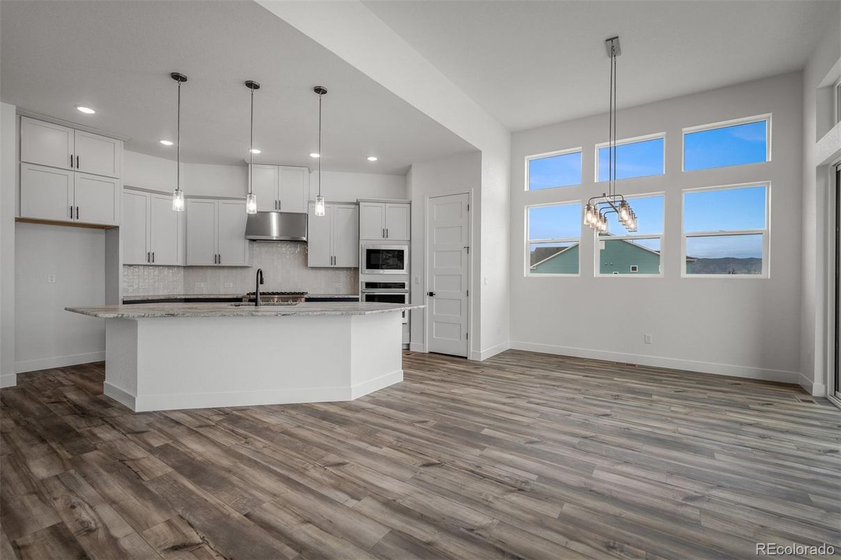 Interior, Kitchen, Pendant Lights, Recessed Lighting, Stainless Steel Appliances, Wood Texture Flooring