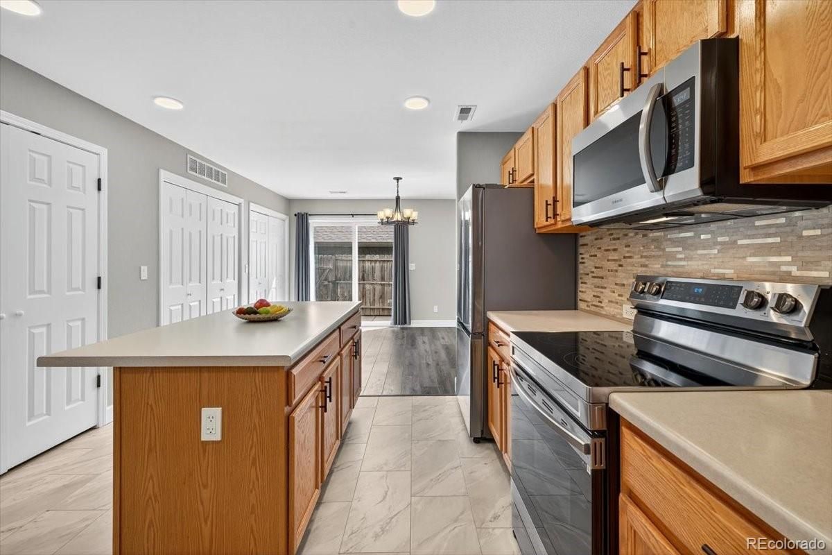 Chandelier, Interior, Kitchen, Marble, Recessed Lighting, Stainless Steel Appliances, Wood Texture Flooring