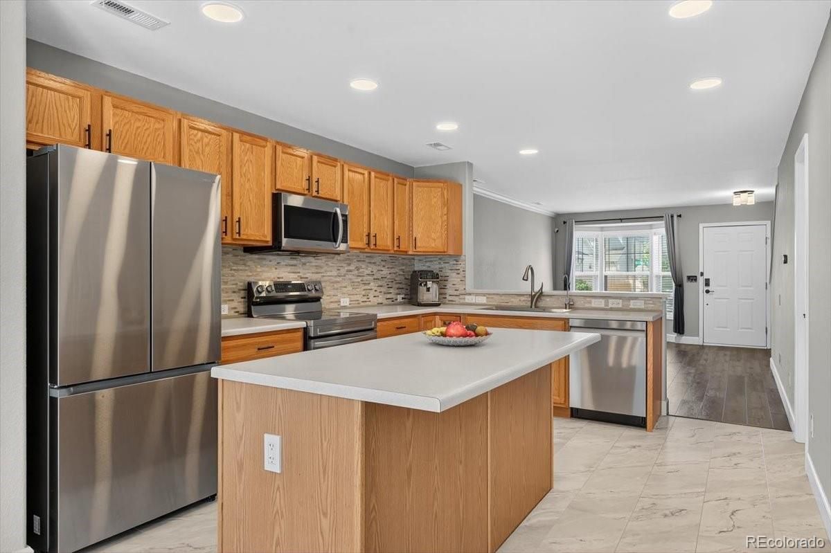 Interior, Kitchen, Marble, Recessed Lighting, Stainless Steel Appliances, Wood Texture Flooring