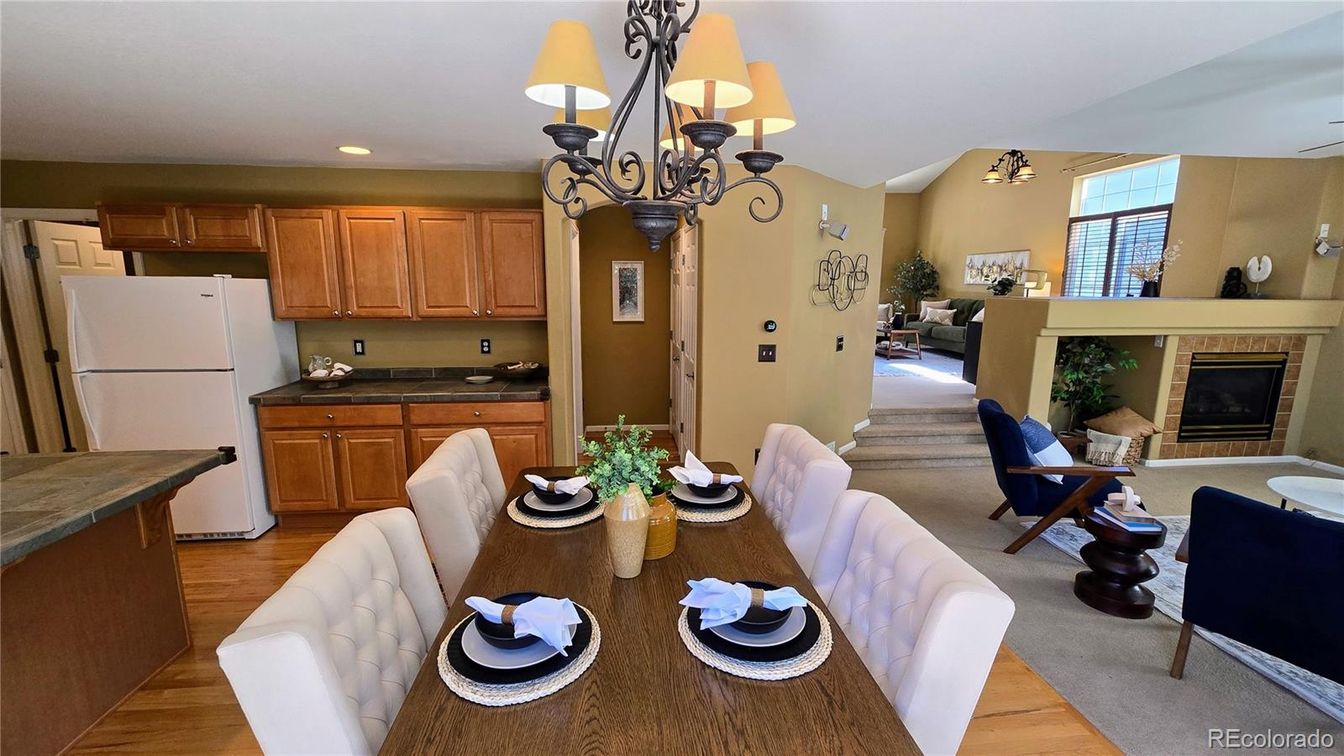 Chandelier, Dining room, Fireplace, Interior, Kitchen, Living room, Recessed Lighting, Wood Texture Flooring