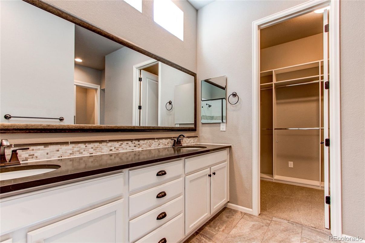 Bathroom, Dual Sink Vanities, Interior, Recessed Lighting, Walk-in Closets