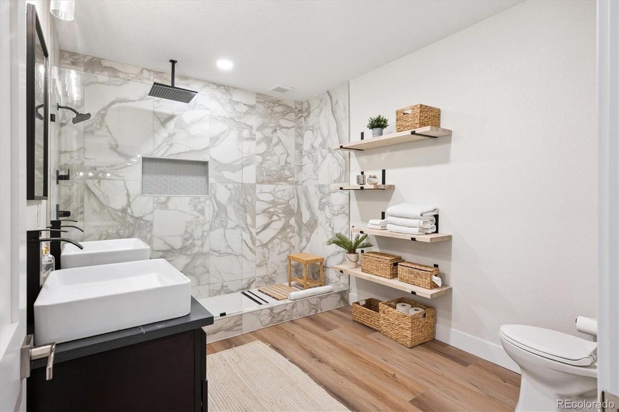 Bathroom, Glass Shower, Interior, Marble Walls, Recessed Lighting, Wood Texture Flooring