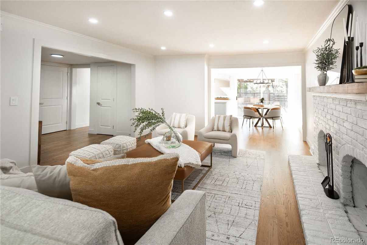 Dining room, Fireplace, Interior, Living room, Recessed Lighting, Wood Texture Flooring