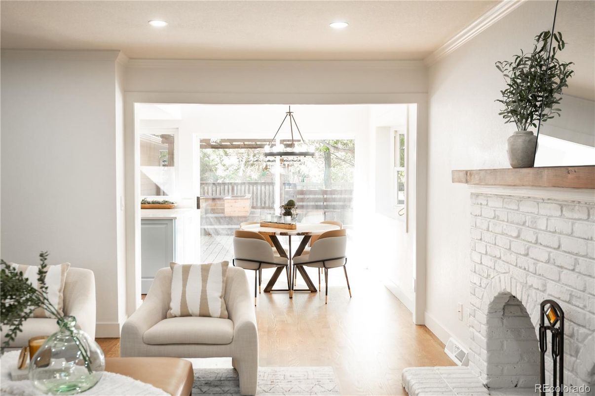 Dining room, Fireplace, Interior, Pendant Lights, Recessed Lighting, Stone Walls, Wood Texture Flooring