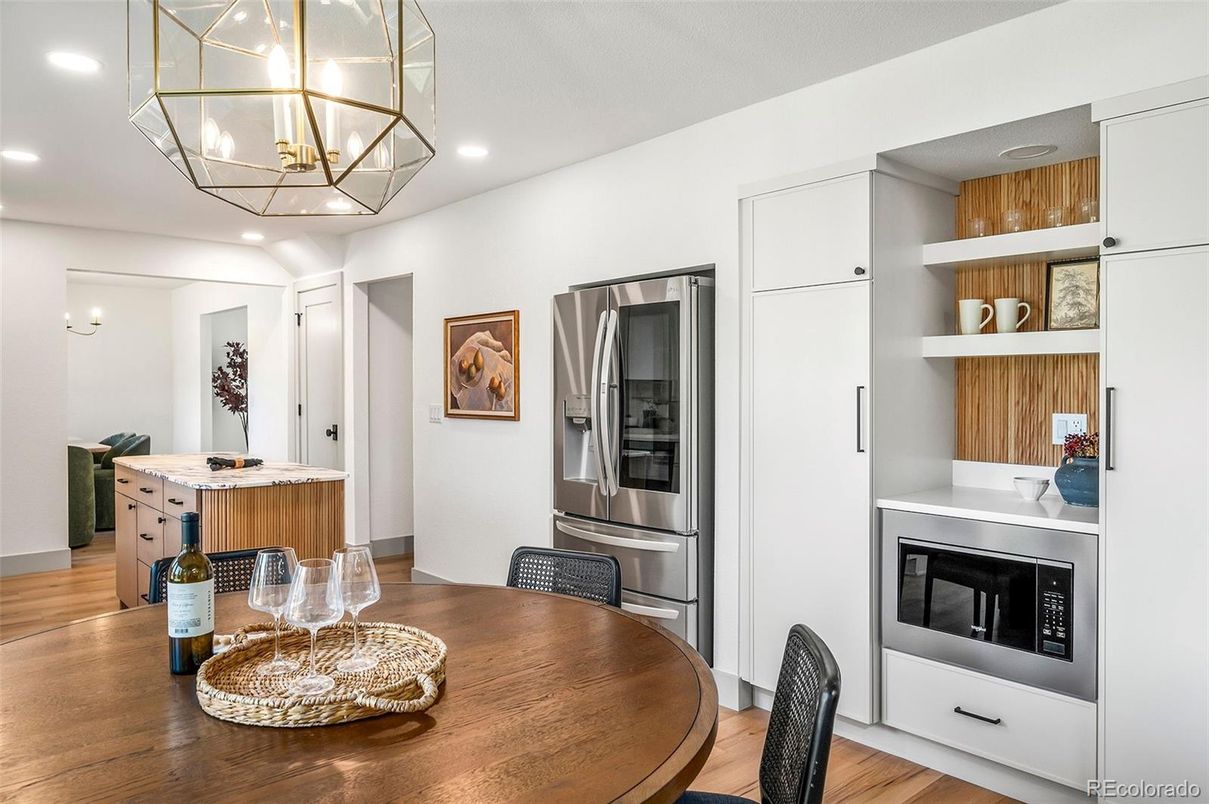 Chandelier, Dining room, Interior, Kitchen, Recessed Lighting, Stainless Steel Appliances, Wood Texture Flooring