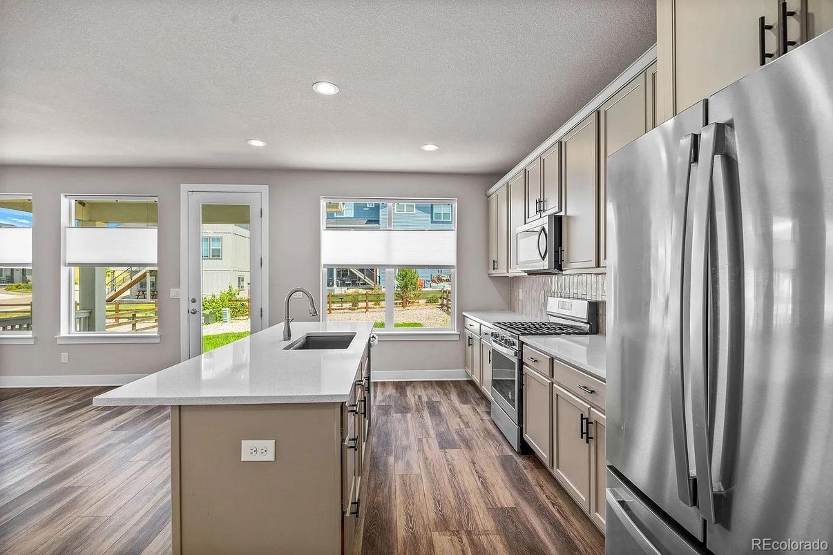 Interior, Kitchen, Recessed Lighting, Stainless Steel Appliances, Wood Texture Flooring