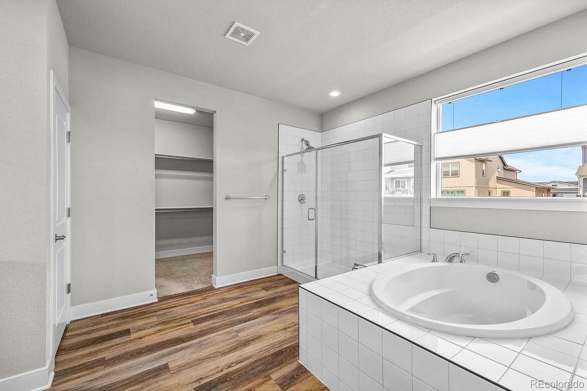 Bathroom, Glass Shower, Interior, Recessed Lighting, Tile Countertops, Wood Texture Flooring