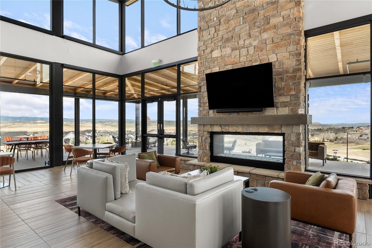 Dining room, Fireplace, Interior, Living room, Stone Walls, Sun Room, Water, Wood Texture Flooring