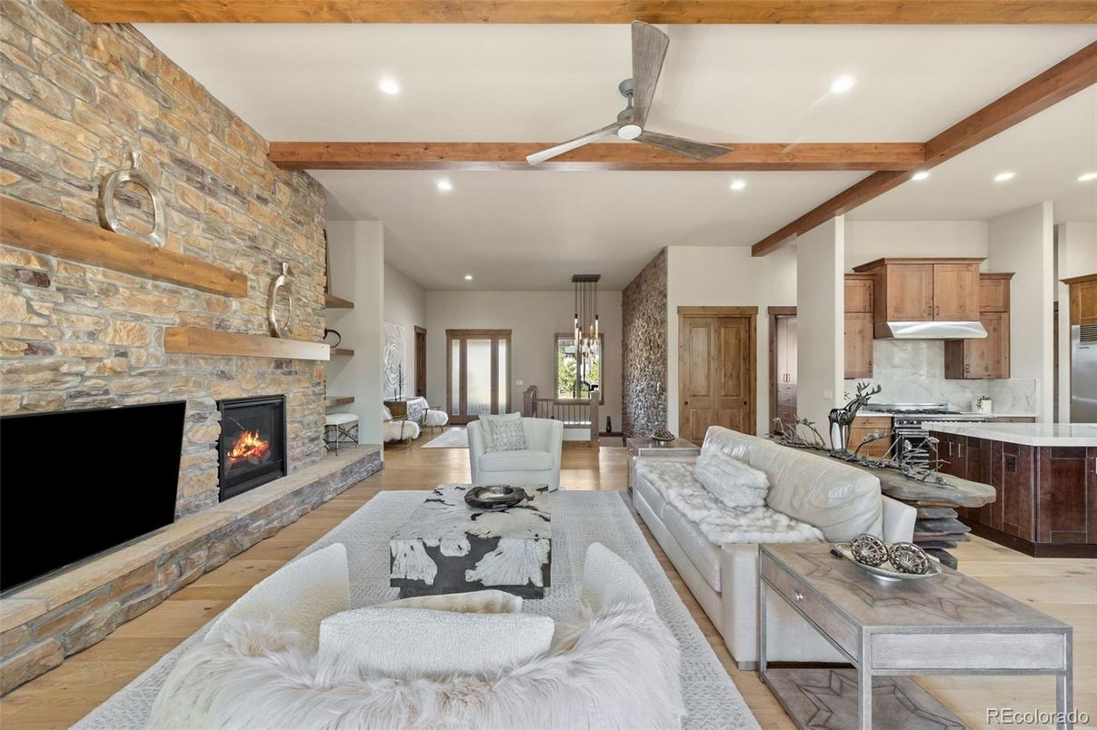 Dining room, Fireplace, Interior, Kitchen, Living room, Pendant Lights, Recessed Lighting, Stone Walls, Wooden Beams, Wood Texture Flooring