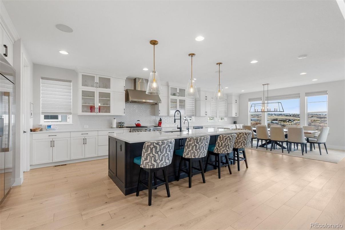 Dining room, Interior, Kitchen, Pendant Lights, Recessed Lighting, Stainless Steel Appliances, Wood Texture Flooring
