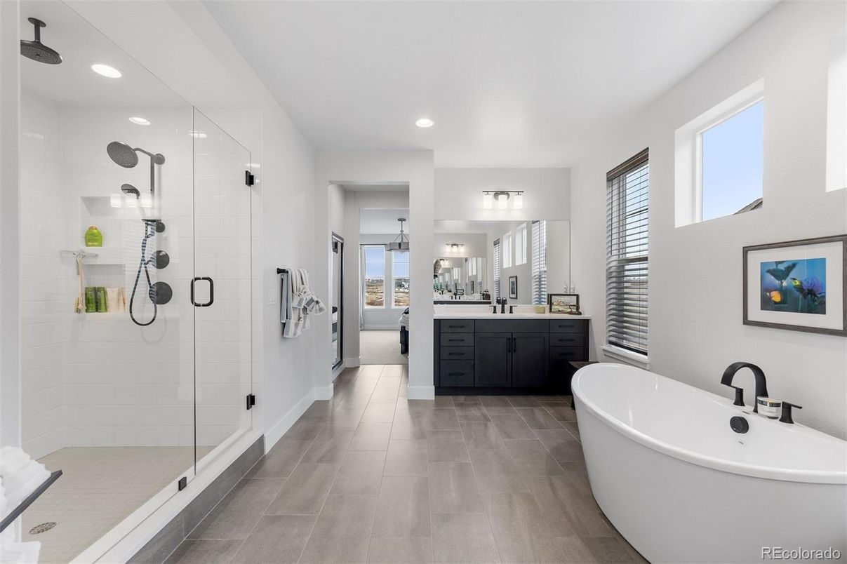 Bathroom, Dual Sink Vanities, Free Standing Baths, Glass Shower, Interior, Recessed Lighting, Wood Texture Flooring