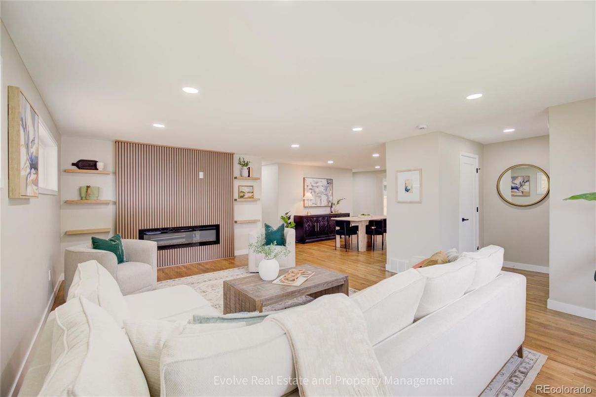 Dining room, Fireplace, Interior, Living room, Recessed Lighting, Wood Texture Flooring
