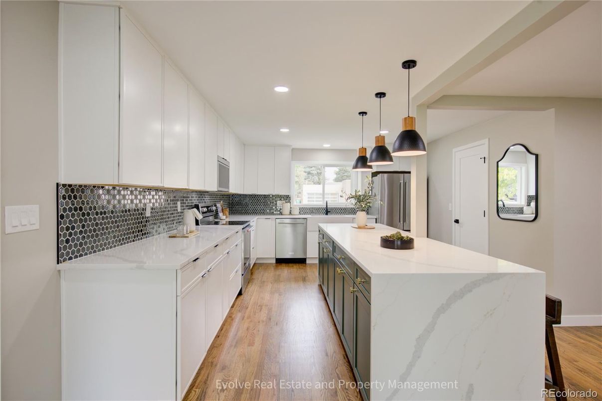 Interior, Kitchen, Pendant Lights, Recessed Lighting, Stainless Steel Appliances, Wood Texture Flooring