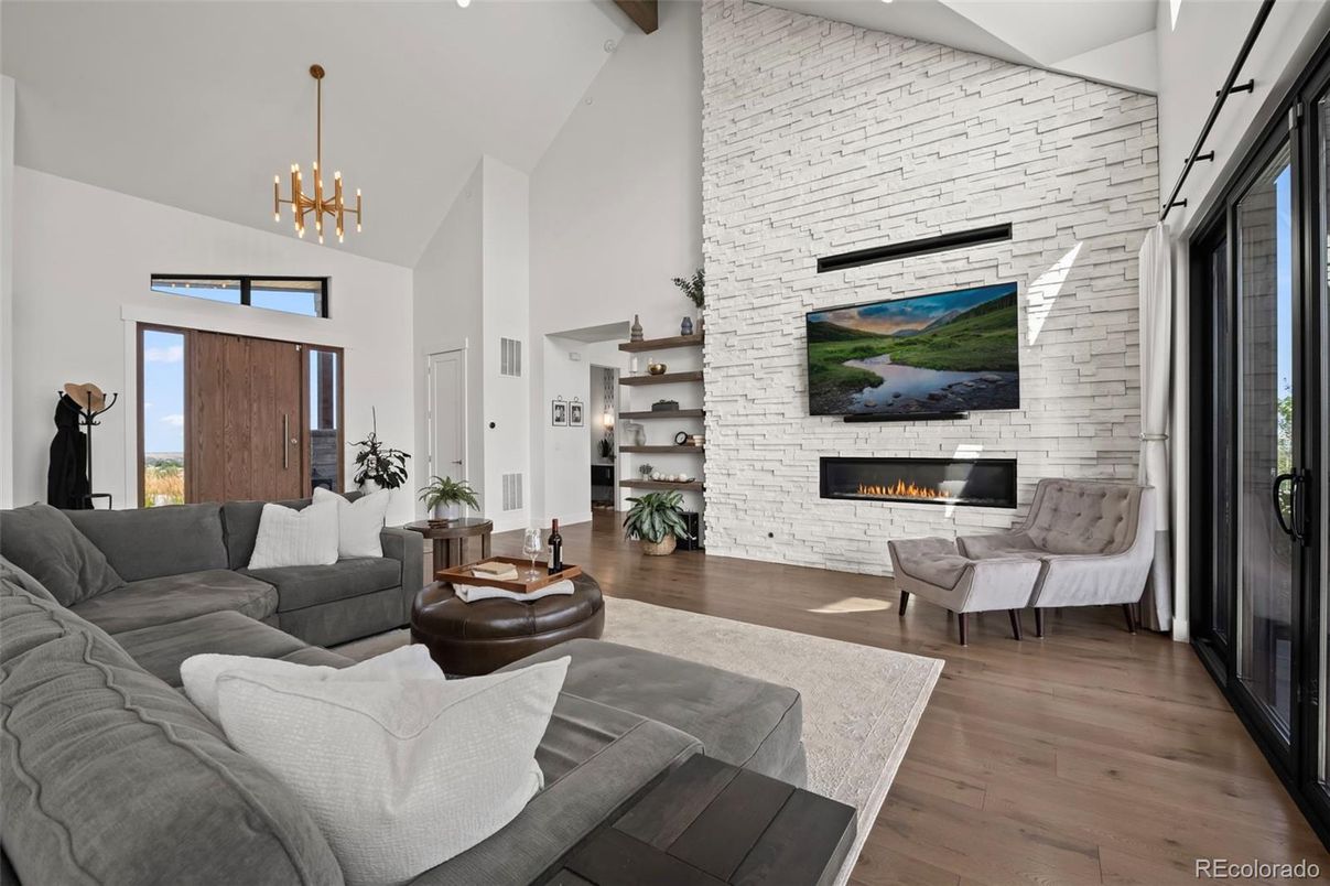 Fireplace, Interior, Living room, Pendant Lights, Stone Walls, Wood Texture Flooring