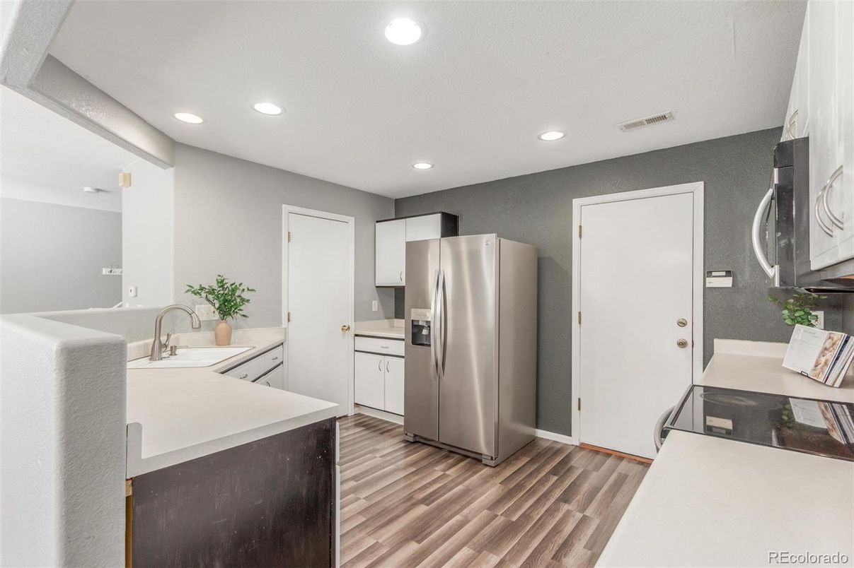 Interior, Kitchen, Recessed Lighting, Stainless Steel Appliances, Wood Texture Flooring