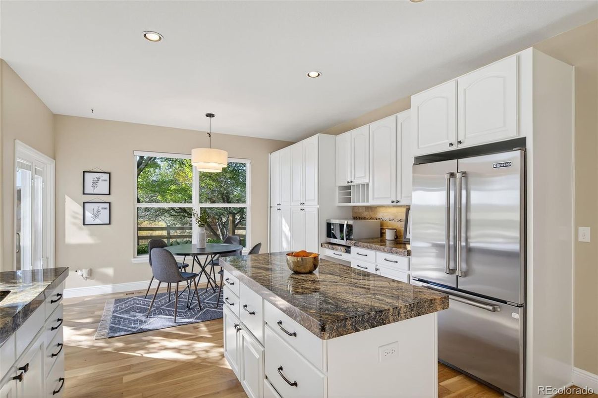 Dining room, Interior, Kitchen, Pendant Lights, Recessed Lighting, Stainless Steel Appliances, Wood Texture Flooring