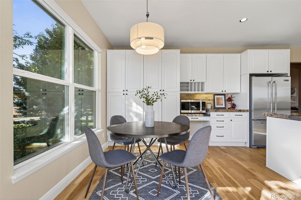 Dining room, Interior, Kitchen, Pendant Lights, Recessed Lighting, Stainless Steel Appliances, Wood Texture Flooring